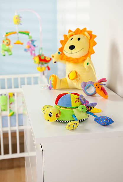istock Soft Baby Toys In Nursery Room 115797502