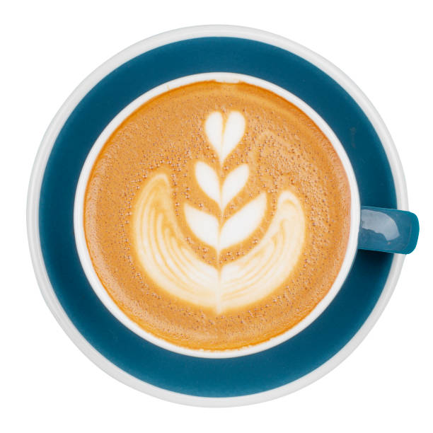 istock Cappuccino drink in blue cup with floral pattern, top view on white background 1157975794