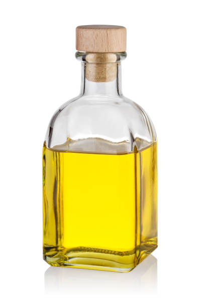 istock Bottle of yellow oil with cap 1157979374