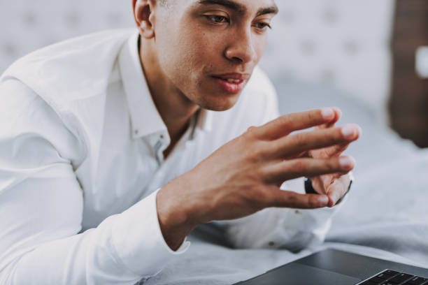 istock Pensive businessman is working on laptop at home 1157979667