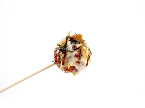 Japanese famous cuisine food takoyaki photo on white backfground Japanese famous cuisine food teriyaki photo on white background takoyaki photos stock pictures, royalty-free photos & images