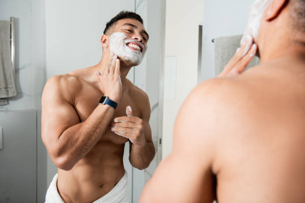 istock Young happy man in shaving foam on face 1157983119