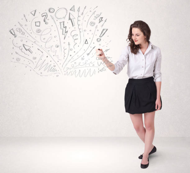 istock Young girl drawing and skteching abstract lines 1157983540