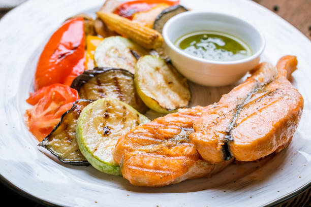 istock Salmon steak on the grill 1157983608