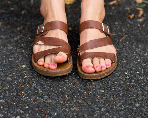 istock Girl's feet 1157984668