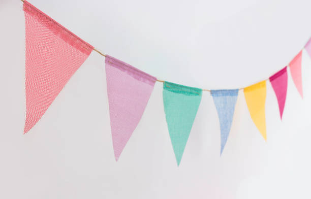istock Colorful flag garland isolated on white background 1157984834