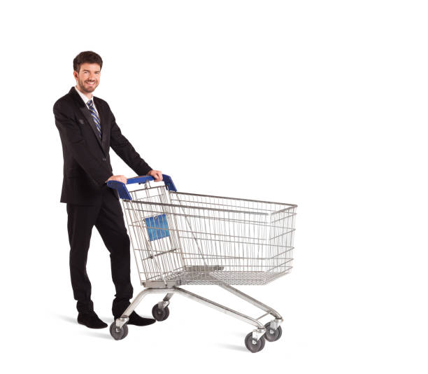 istock Businessman with shopping cart 1157988381