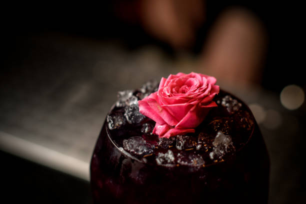 Close shot of alcohol drink decorated with flower