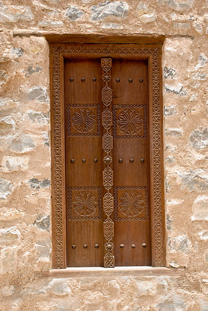 istock Old Omani house door detail 115798916