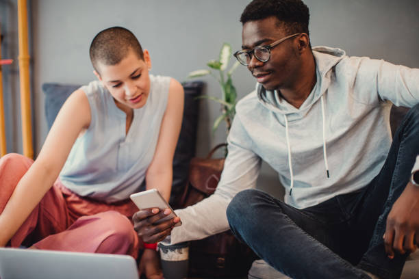 istock Young Entrepreneurs Brainstorming And Using Laptop 1157990259