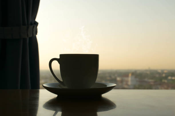 istock beauty silhouette coffee cup 1157990269