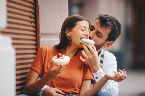 istock Happy young couple having fun outdoors 1157992464