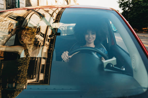 istock Two friends together in the car 1157992497