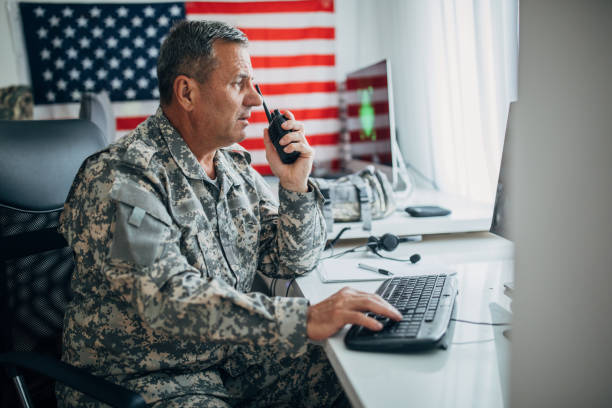 istock Army soldier using walkie- talkie 1157994491