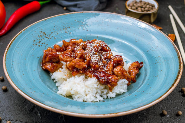 istock chicken with rice in Chinese sauce 1157996663