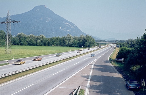 Upper Bavaria, Germany, 1976. Mobility and connections, highway through alpine landscape.