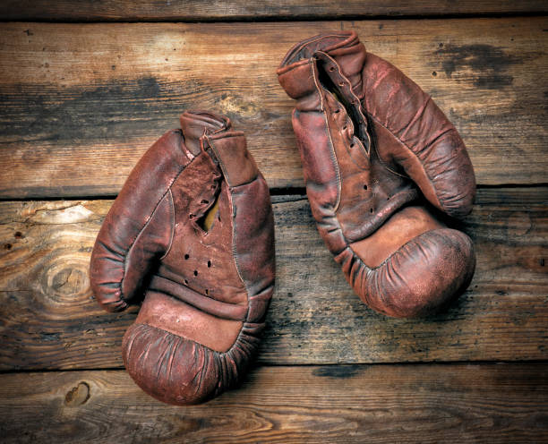 istock very old leather brown boxing gloves 1157999696