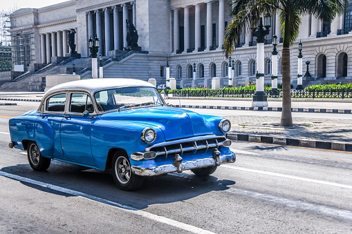 Blue Old Timer Car Near El Capitolio Building In Havana, Cuba