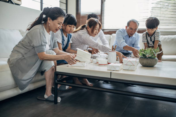 istock Happy family having meal 1158003018