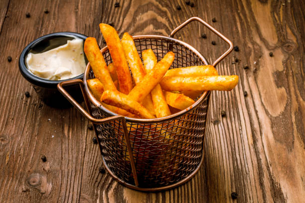 istock French fries with cheese sauce 1158003420