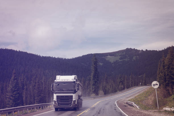 istock Semi truck on mountain road 1158003580