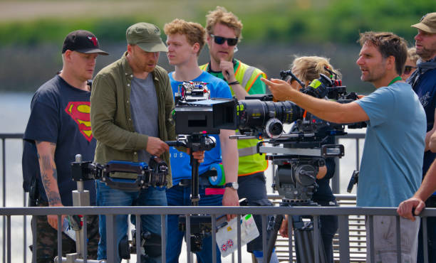 Film team on the jetties in Hamburg harbour produces a film. Hamburg, Germany, June 13., 2019: Film team on the jetties in Hamburg harbour produces a film. sound port stock pictures, royalty-free photos & images