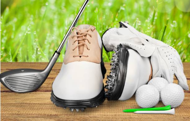 Golf. Pair of Golf Shoes with Glove, Ball, Tees and Golf Driver golf glove stock pictures, royalty-free photos & images