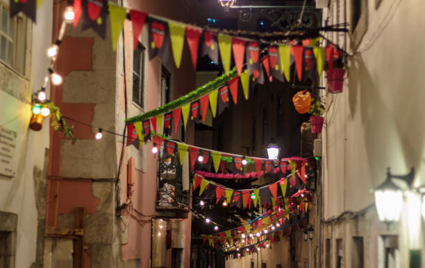 typical portuguese popular saints decoration in a street - santos populares imagens e fotografias de stock
