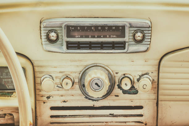 Retro styled image of an old car dashboard Retro styled image of an old dashboard inside a classic car vehicle interior audio stock pictures, royalty-free photos & images