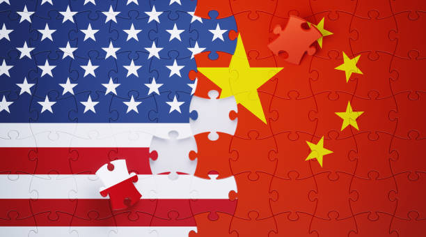istock Jigsaw Puzzle Pieces Textured With American and Chinese Flags 1158017452