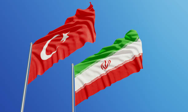 istock Turkish and Iranian Flags Waving With Wind 1158020889