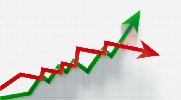 istock Red And Green Arrows Over Graph Paper Background 1158023828