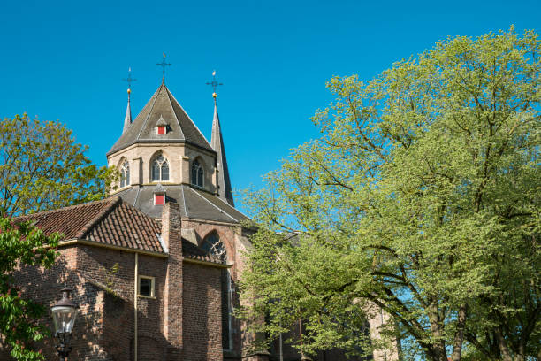 istock Church Bergkerk in Deventer, The Netherlands. Against blue sky 1158024151