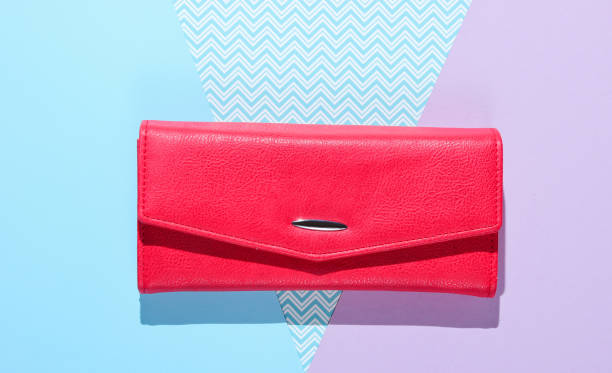 istock Red leather wallet on pastel background. Top view 1158026761