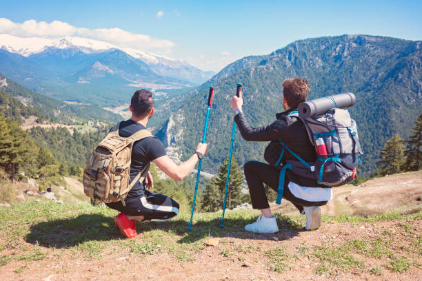 istock Two hiker men success concept in mountains 1158027304