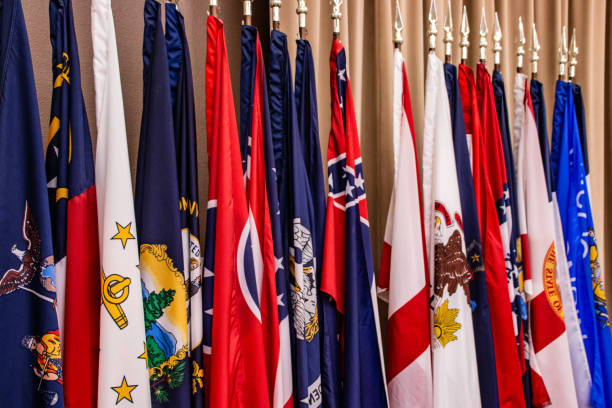 State Flags A row of flags from many states. us state flag stock pictures, royalty-free photos & images
