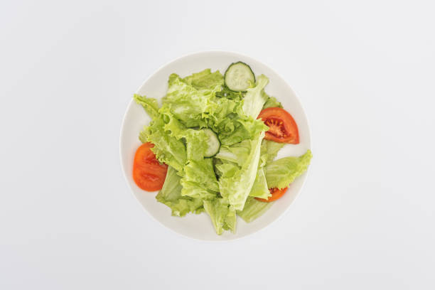 istock top view of chopped salad on plate isolated on white 1158030513