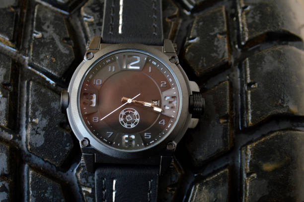 Black sport watch and tire car