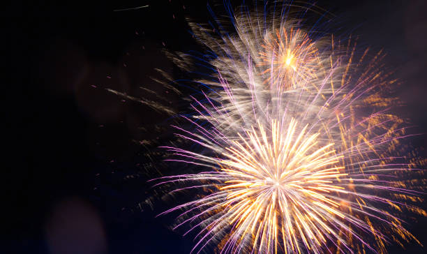 istock Festive fireworks display lit up over night sky. Celebration concept. Copy space. . Great holiday of a great country. The celebration of Independence Day in the United States of America. 4th of July. 1158032910