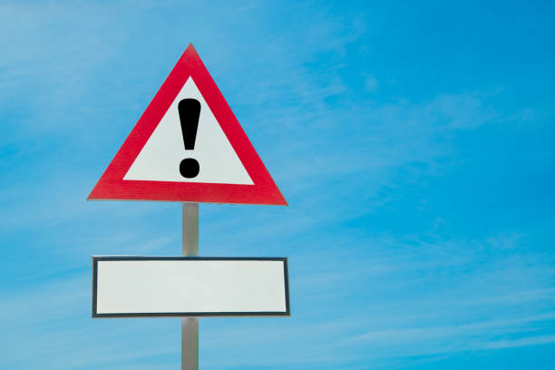 istock Exclamation point of attention against the sky. 1158035427