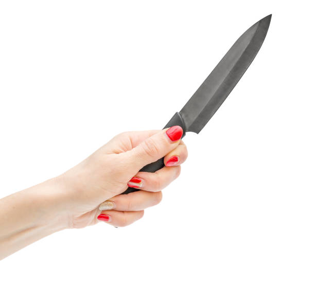 Woman hand holding kitchen knife. Isolated on white background.