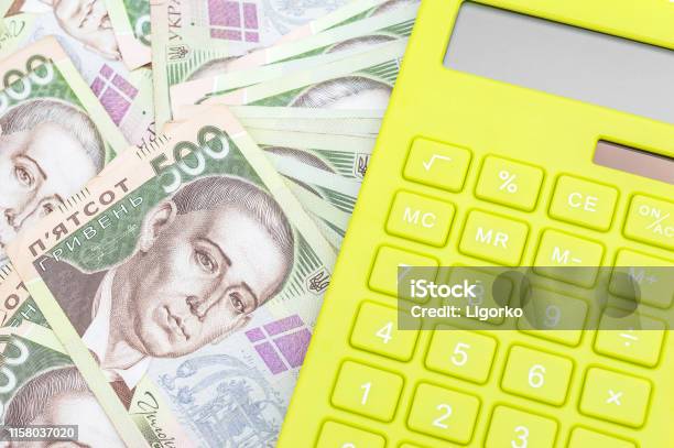 Calculator On 500 Hryvnia Bills Close Up Top View Stock Photo - Download Image Now