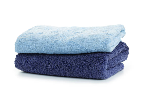 istock Stacked coloful  towels isolated on white background 1158041979