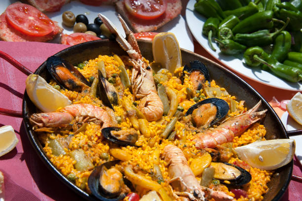 istock Large seafood paella in traditional bowl 1158042848