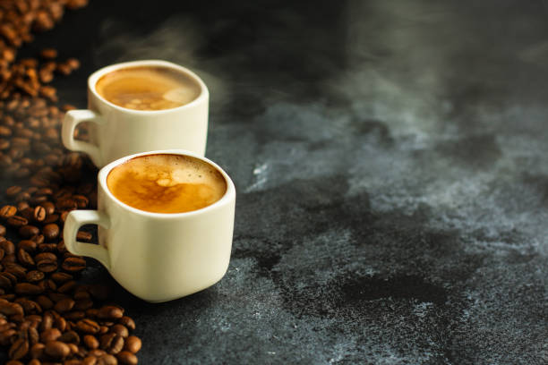 istock coffee in a white cup. food background. top 1158043009
