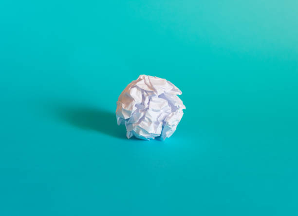 istock Concept of bright idea with paper and light bulbs 1158044997
