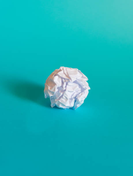 istock Concept of bright idea with paper and light bulbs 1158044998