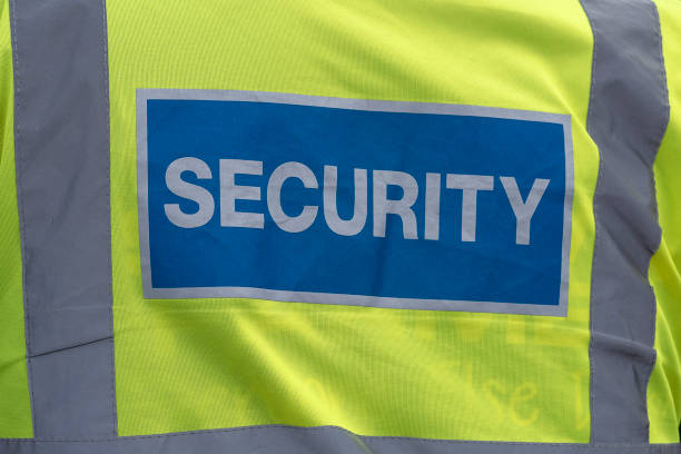 istock Rear View of Security Guard Vest 1158046859