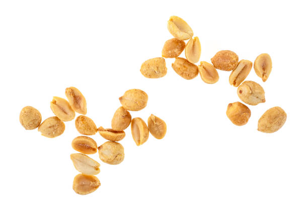 istock Roasted salted peanuts isolated on a white background, top view. 1158053666