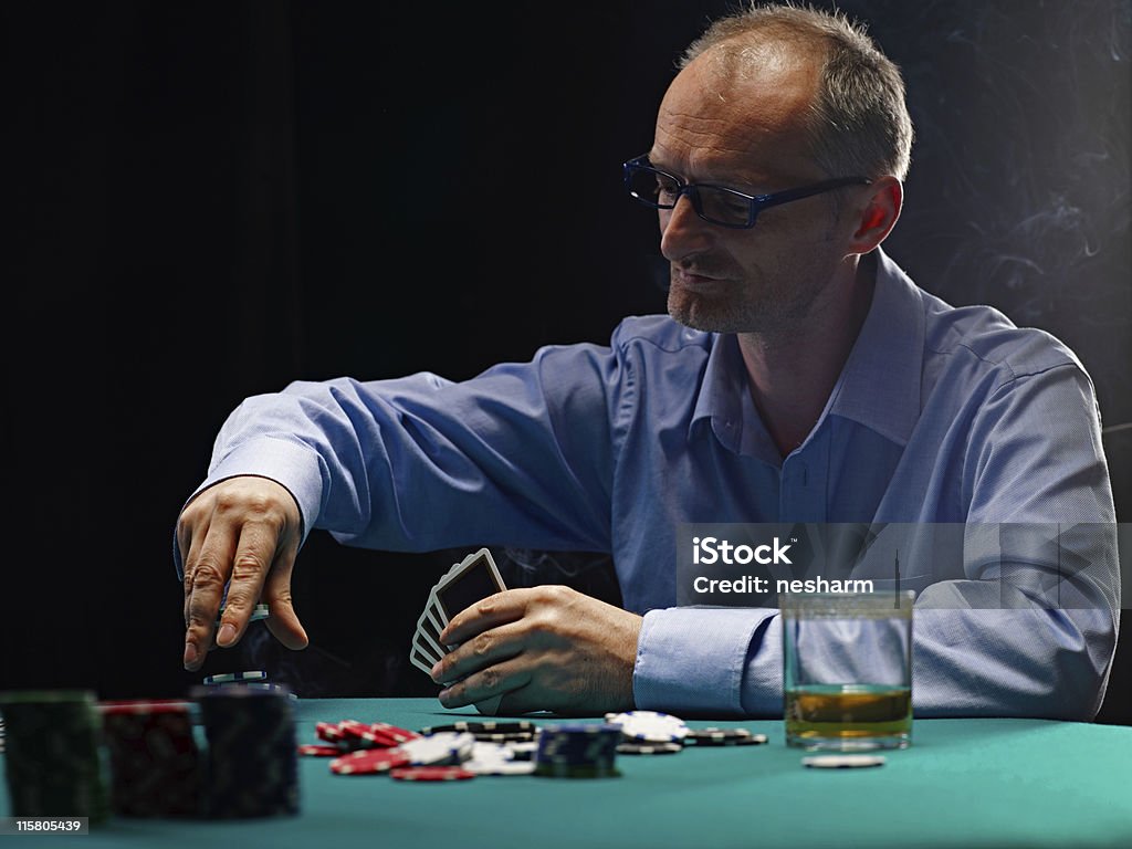 Man Playing Poker Stock Photo - Download Image Now - 35-39 Years.